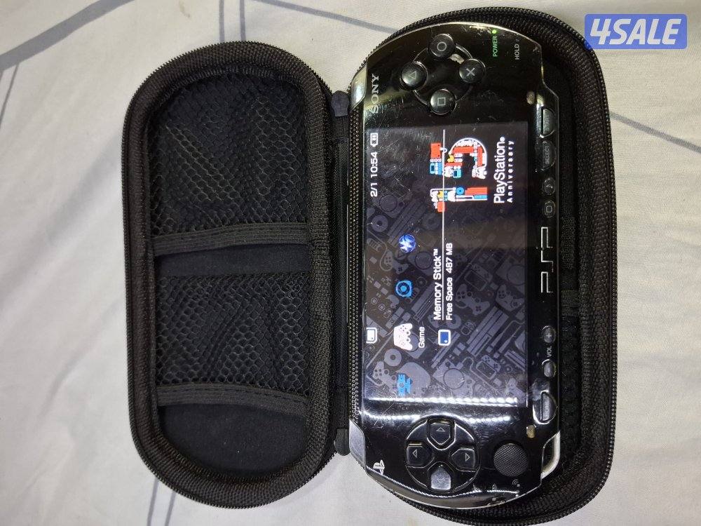PSP SONY P1000 MODEL.BLACK COLOR 8GB SDCARD WITH 50GAMES3