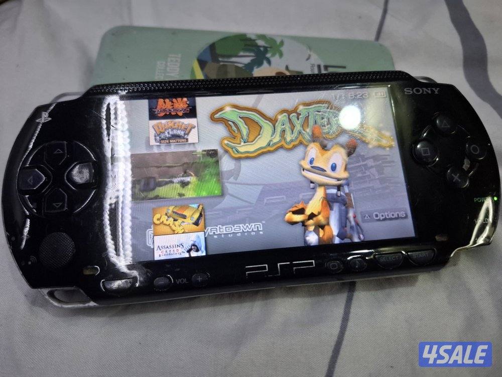 PSP SONY P1000 MODEL.BLACK COLOR 8GB SDCARD WITH 50GAMES5