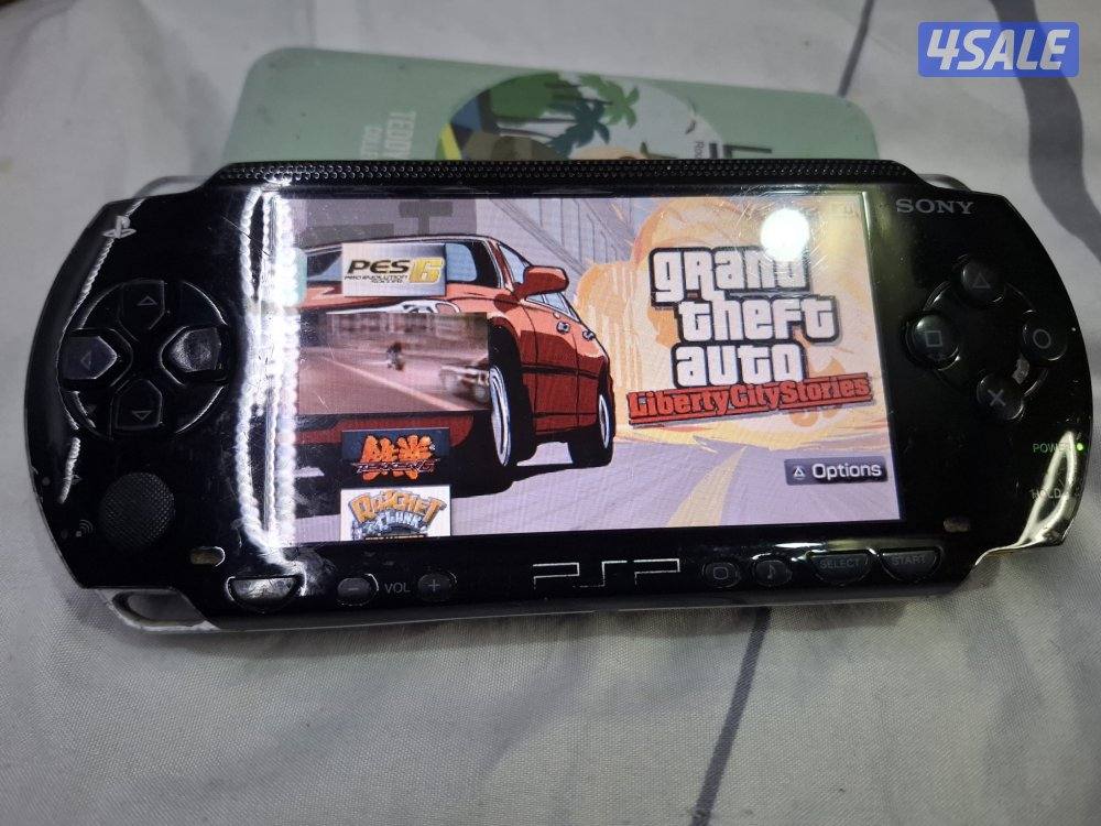 PSP SONY P1000 MODEL.BLACK COLOR 8GB SDCARD WITH 50GAMES7