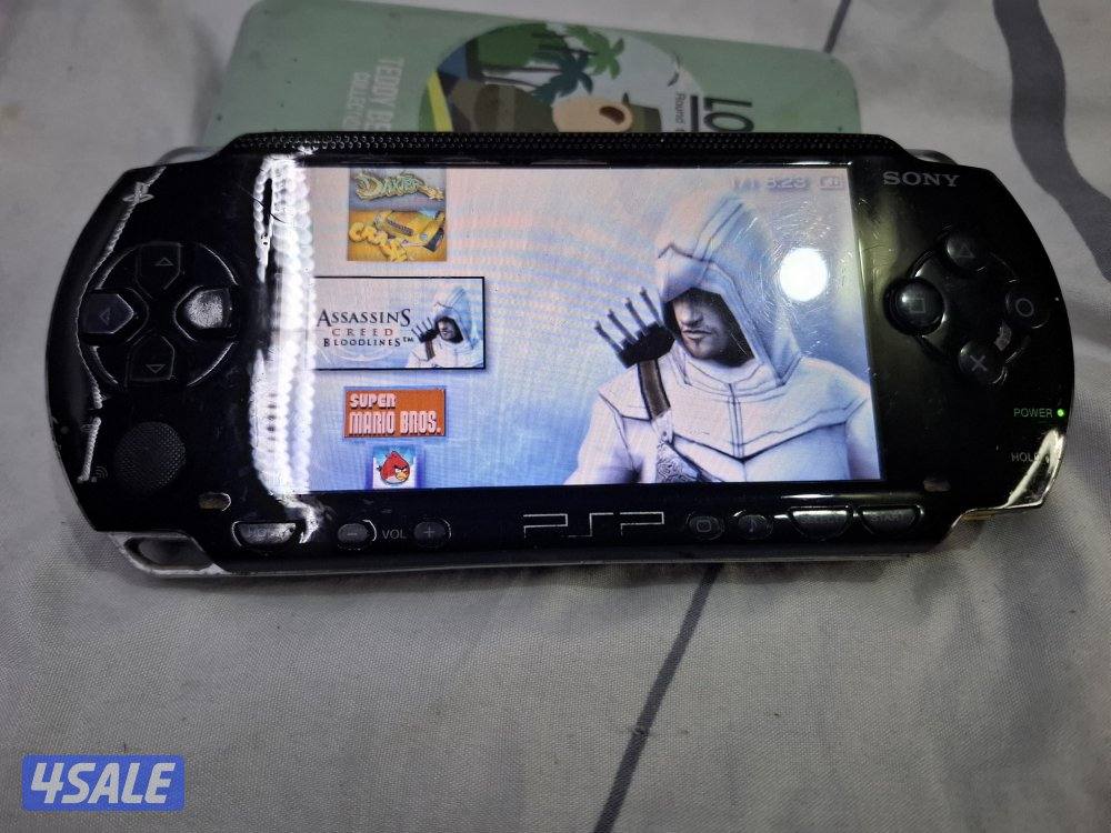 PSP SONY P1000 MODEL.BLACK COLOR 8GB SDCARD WITH 50GAMES6