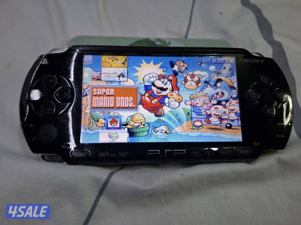 PSP SONY P1000 MODEL.BLACK COLOR 8GB SDCARD WITH 50GAMES9
