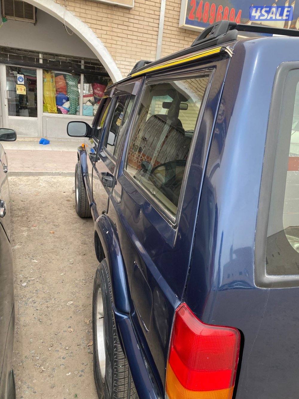 للبيع شروكي كلاسيك موديل 2000 لون كحلي تكيف بارد لا يوجد حرار نهائي3