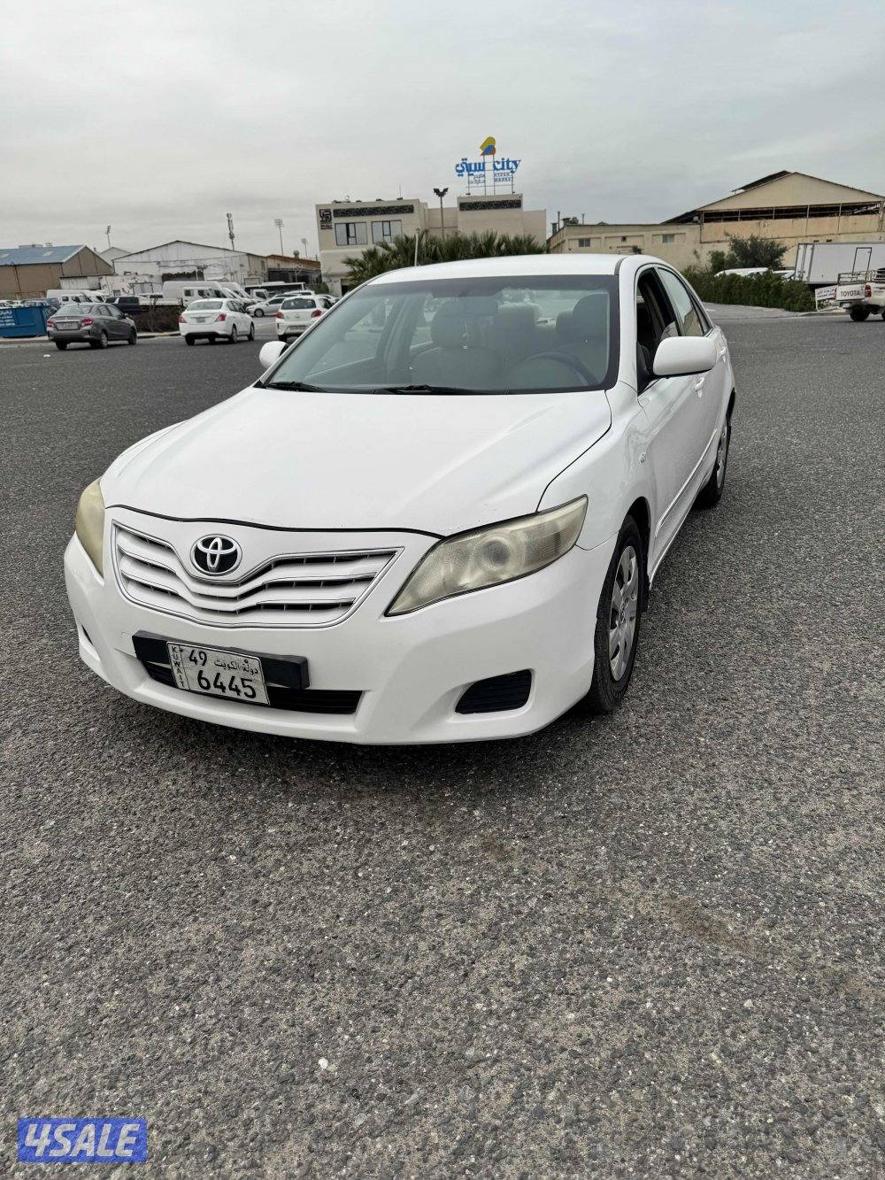 كامري موديل 2010 اللون ابيض ماشيه 287 GL شرط الفحص قير ومكينه وشاصي0