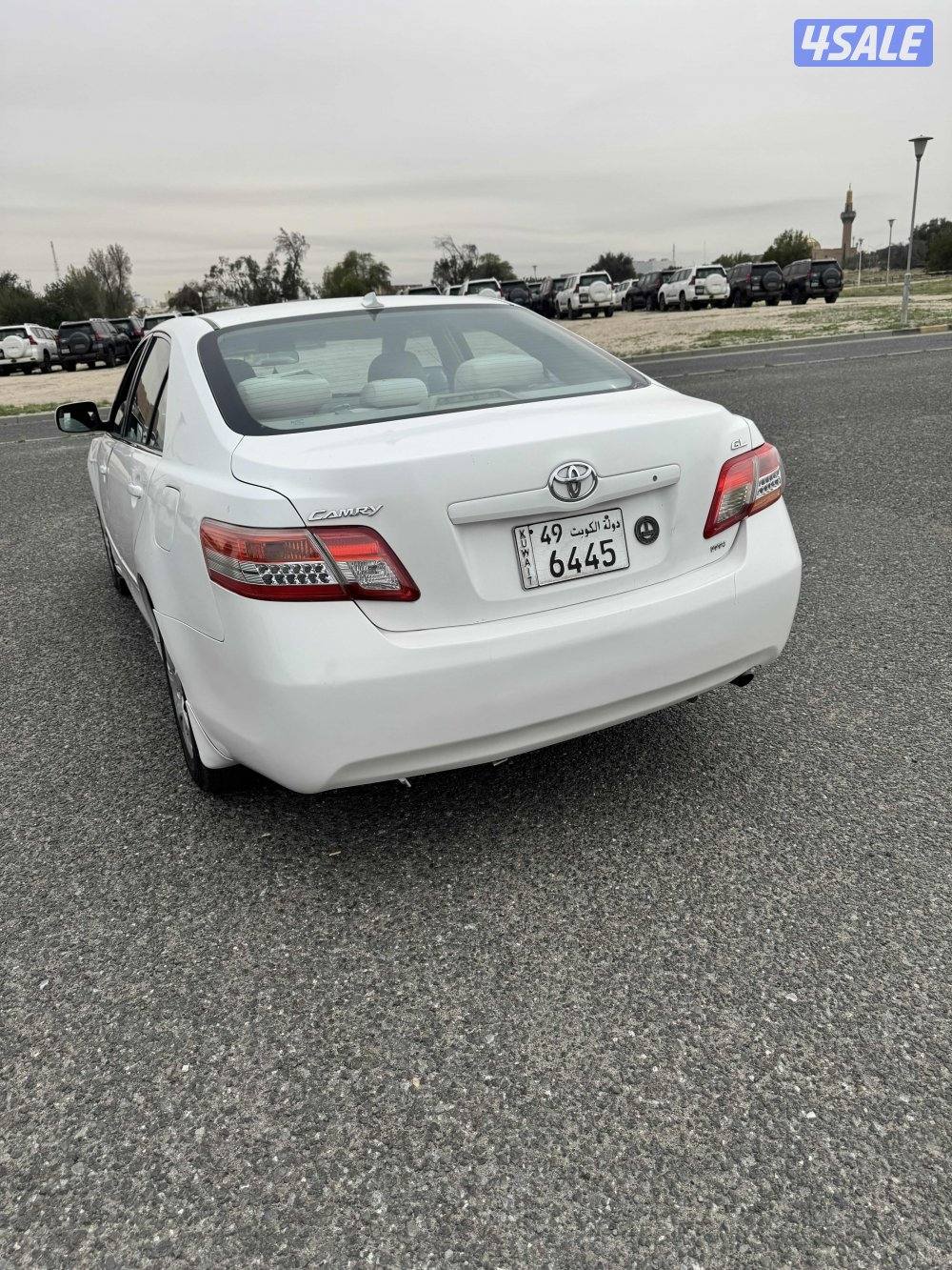 كامري موديل 2010 اللون ابيض ماشيه 287 GL شرط الفحص قير ومكينه وشاصي2