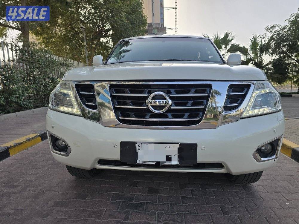 نيسان باترول  صبغ الوكااااااه موديل 2015 بحالهً ممتازه ماشي 200 الف شرط8