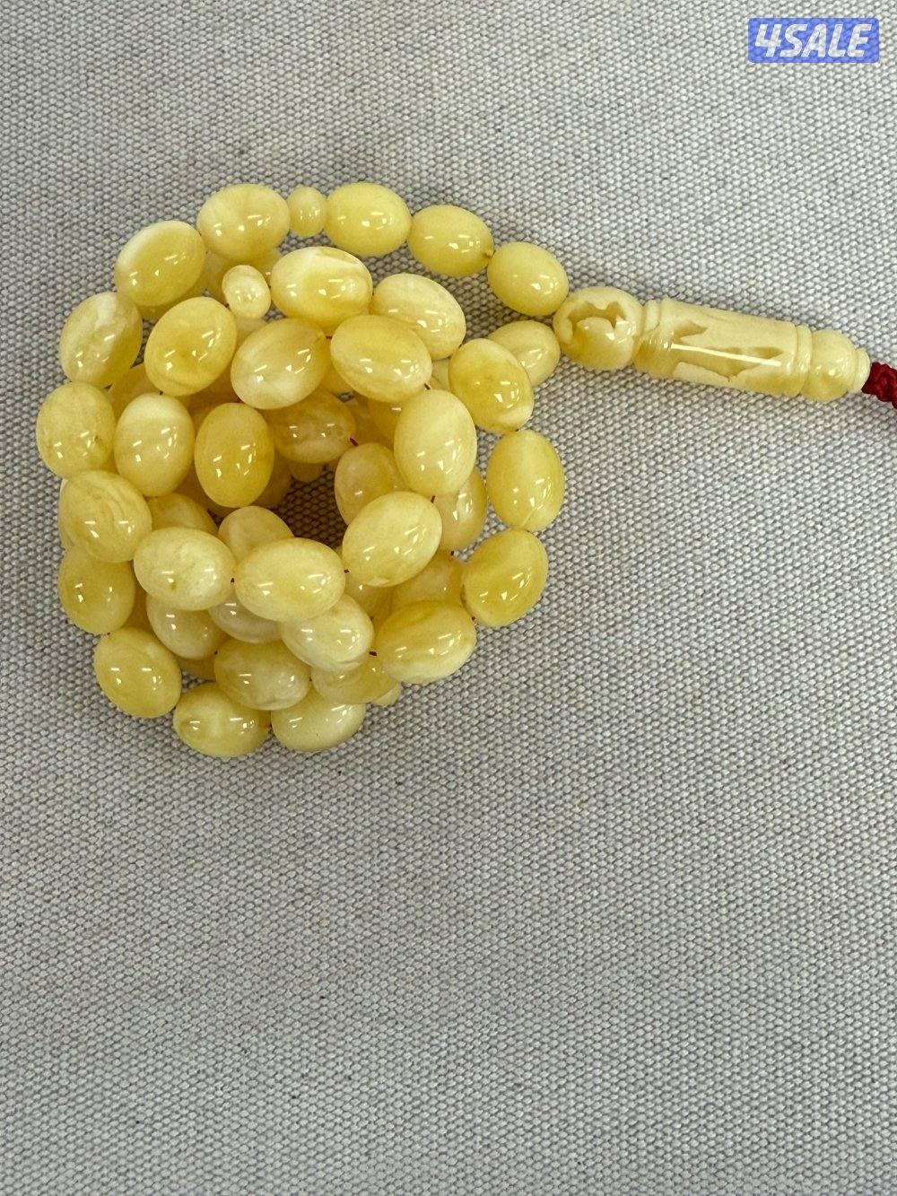 كهرب بيض حمام مبرقع بياض ، ٤٩ غ ، ٦٩ خ، ١٢/٩.٥ ملي تقريبا3