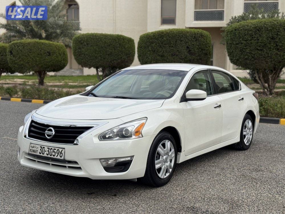نيسان التيما موديل 2014 بحاله ممتازه وشرط الفحص0