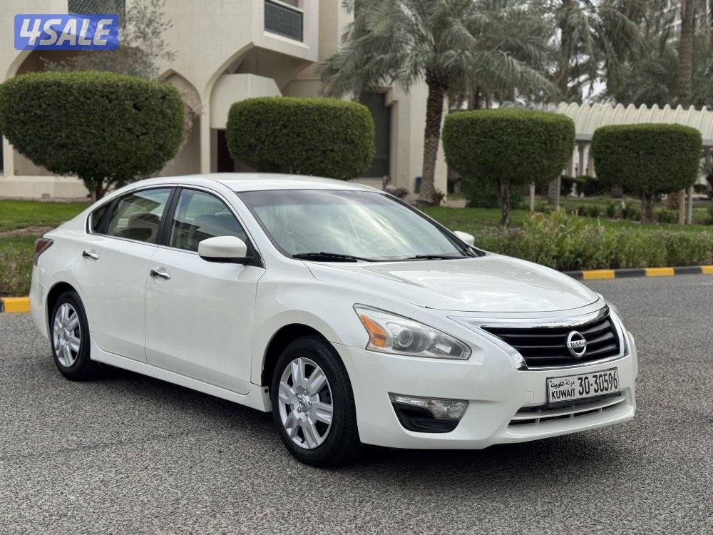 نيسان التيما موديل 2014 بحاله ممتازه وشرط الفحص1
