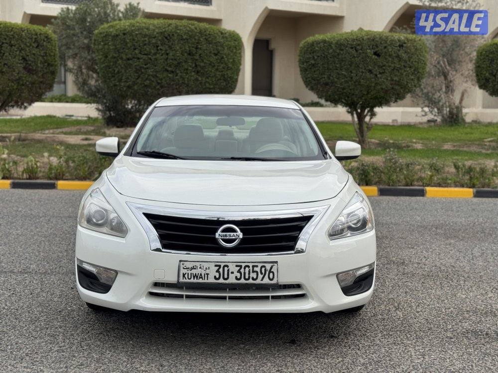 نيسان التيما موديل 2014 بحاله ممتازه وشرط الفحص2