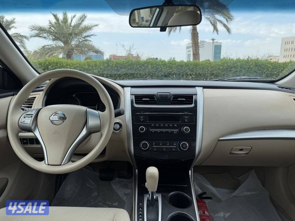 نيسان التيما موديل 2014 بحاله ممتازه وشرط الفحص9