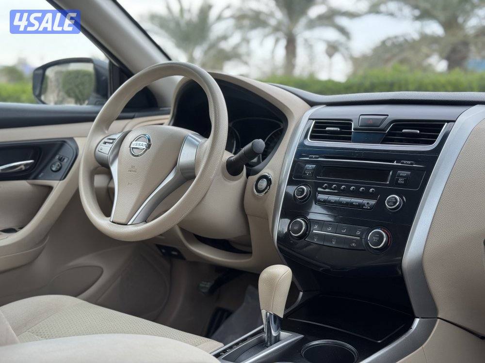 نيسان التيما موديل 2014 بحاله ممتازه وشرط الفحص10