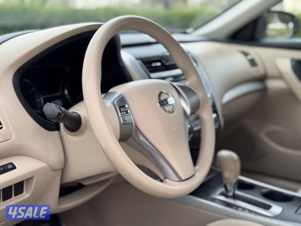 نيسان التيما موديل 2014 بحاله ممتازه وشرط الفحص11