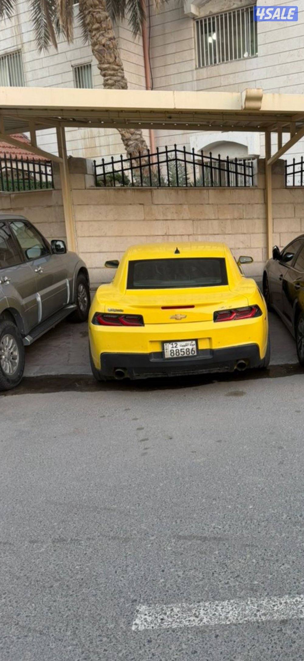 للبيع كمارو موديل 2014اللون اصفر واسود مسجل بالدفتر ٦ سلندر55571/1132