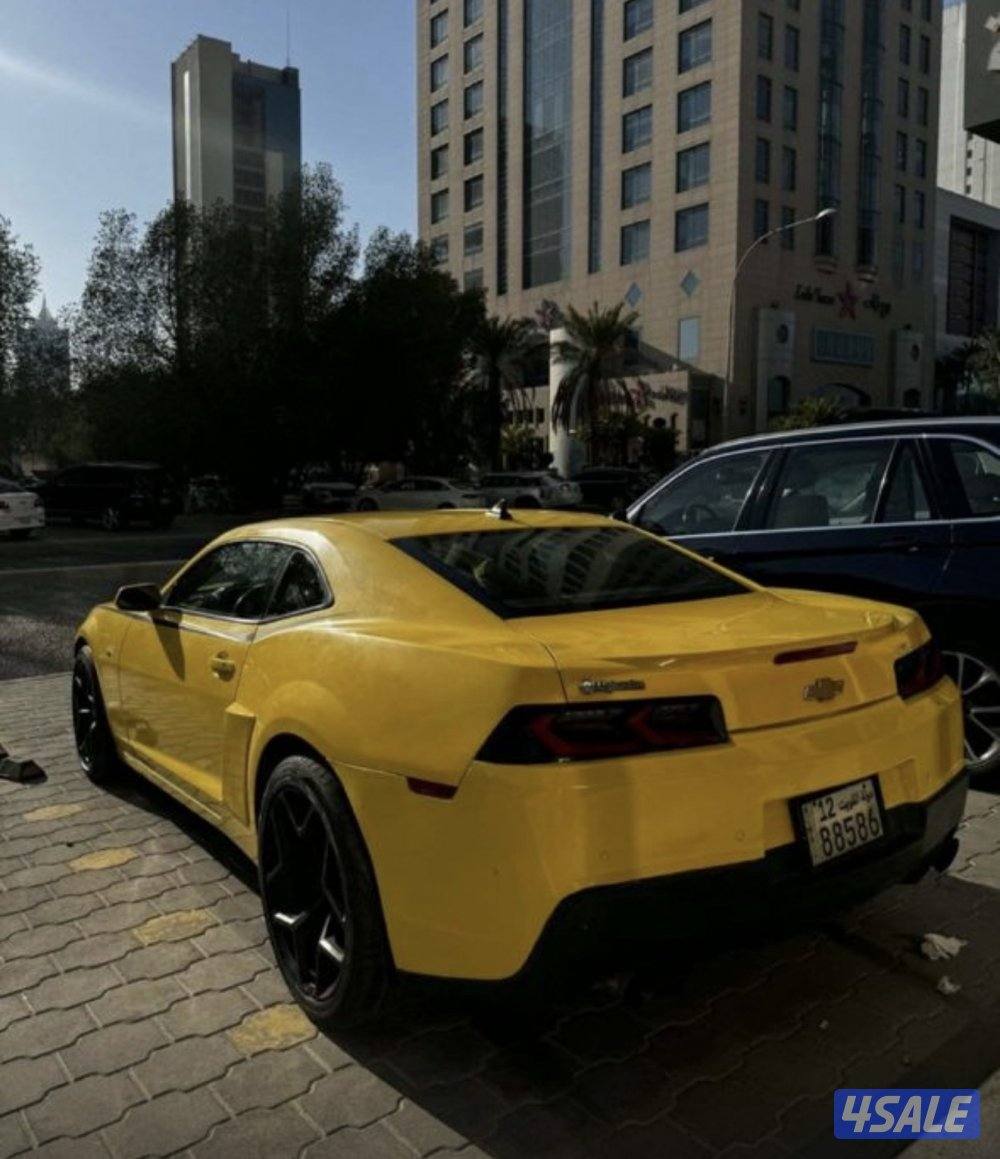 للبيع كمارو موديل 2014اللون اصفر واسود مسجل بالدفتر ٦ سلندر55571/1134