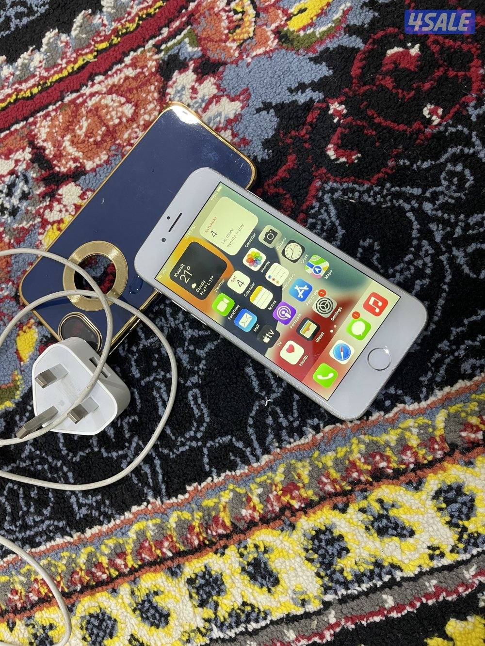 ايفون 7 السابع 128 جيجابايت مو نظيف وشغال مع كفر1