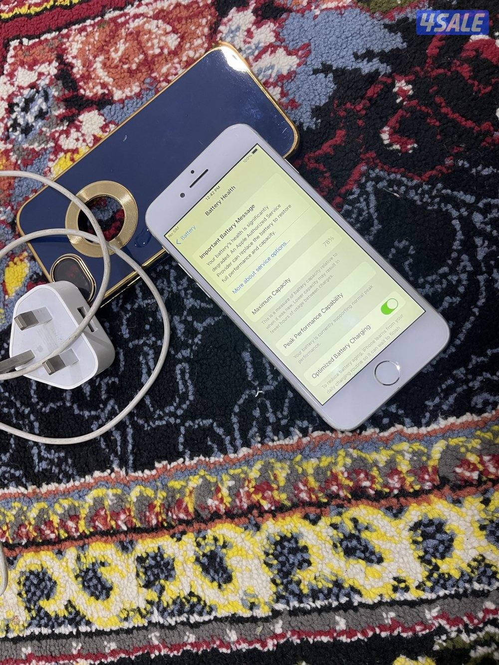 ايفون 7 السابع 128 جيجابايت مو نظيف وشغال مع كفر3