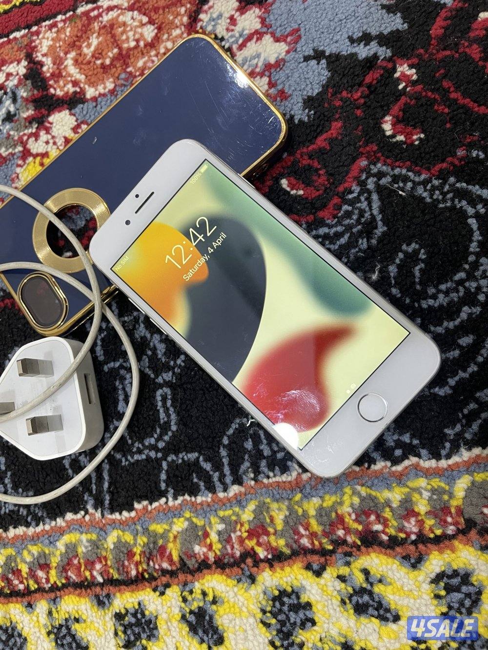 ايفون 7 السابع 128 جيجابايت مو نظيف وشغال مع كفر5