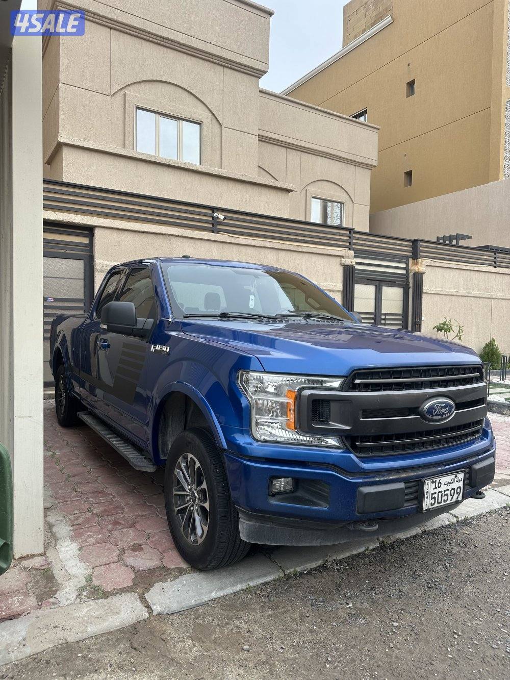 وانيت فورد سبورت من غير دبل شرط الفحص صبغ وكاله1