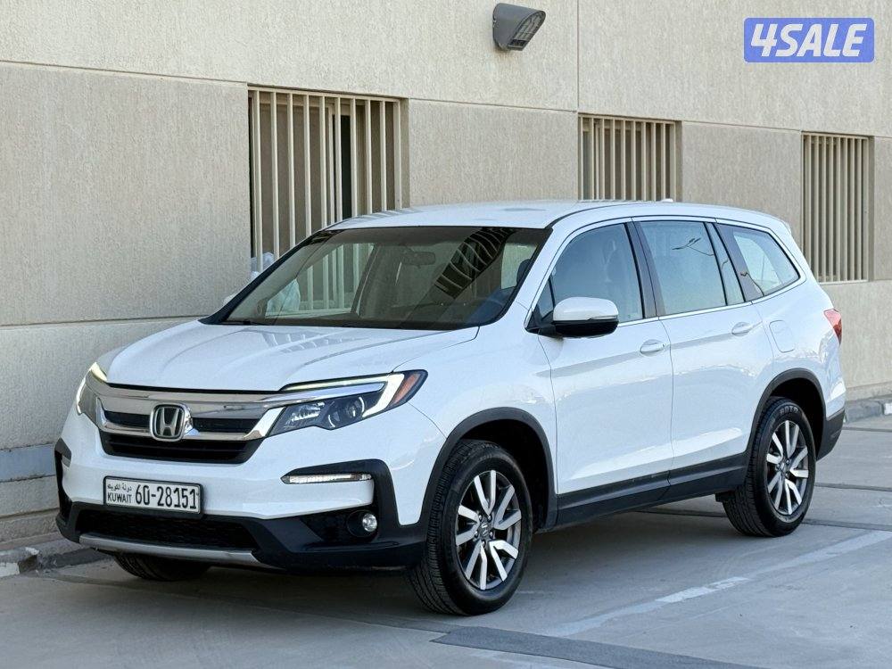 للبيع - هوندا بايلوت - موديل 2021 - عداد 136 - وارد الغانم - شرط الفحص0