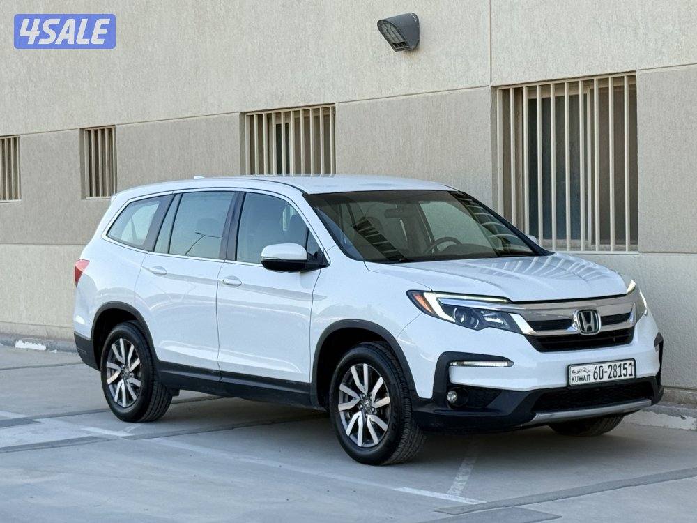 للبيع - هوندا بايلوت - موديل 2021 - عداد 136 - وارد الغانم - شرط الفحص1