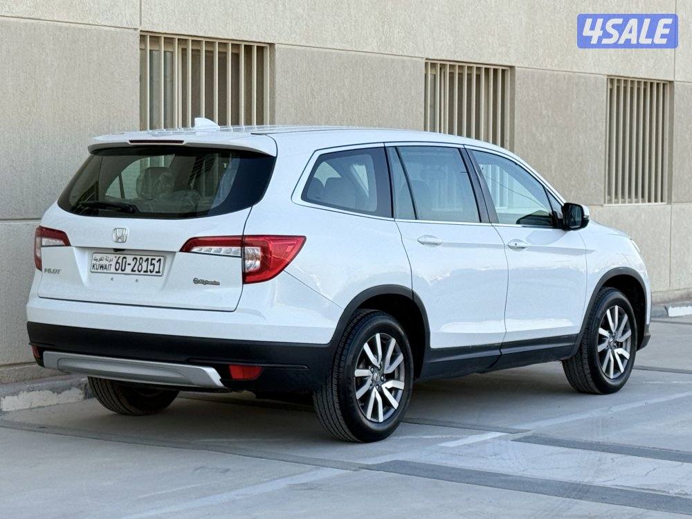 للبيع - هوندا بايلوت - موديل 2021 - عداد 136 - وارد الغانم - شرط الفحص2