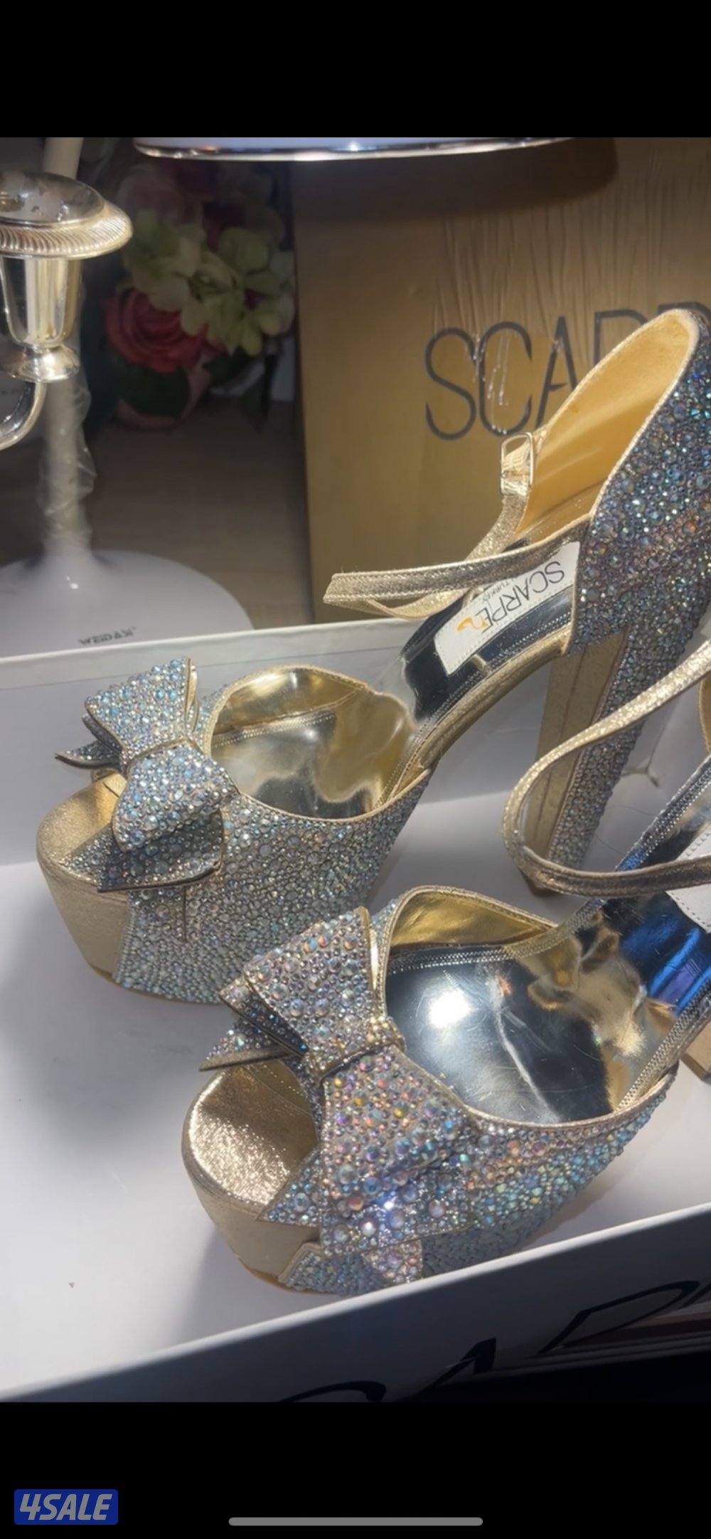 كعب ماركة سكاربي التركية  جديد بالكرتون قياس ٣٩  حق عروس او ملجه0