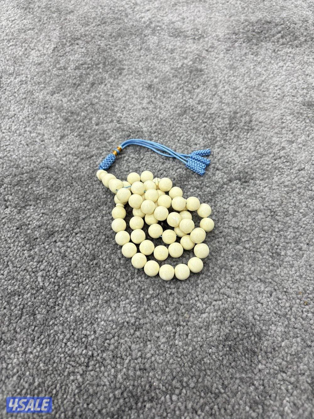 ‏مسباح مستكة مصري عدد الخرز٥٣ ملي ٩ لون كريمي كركوشه سماوية0