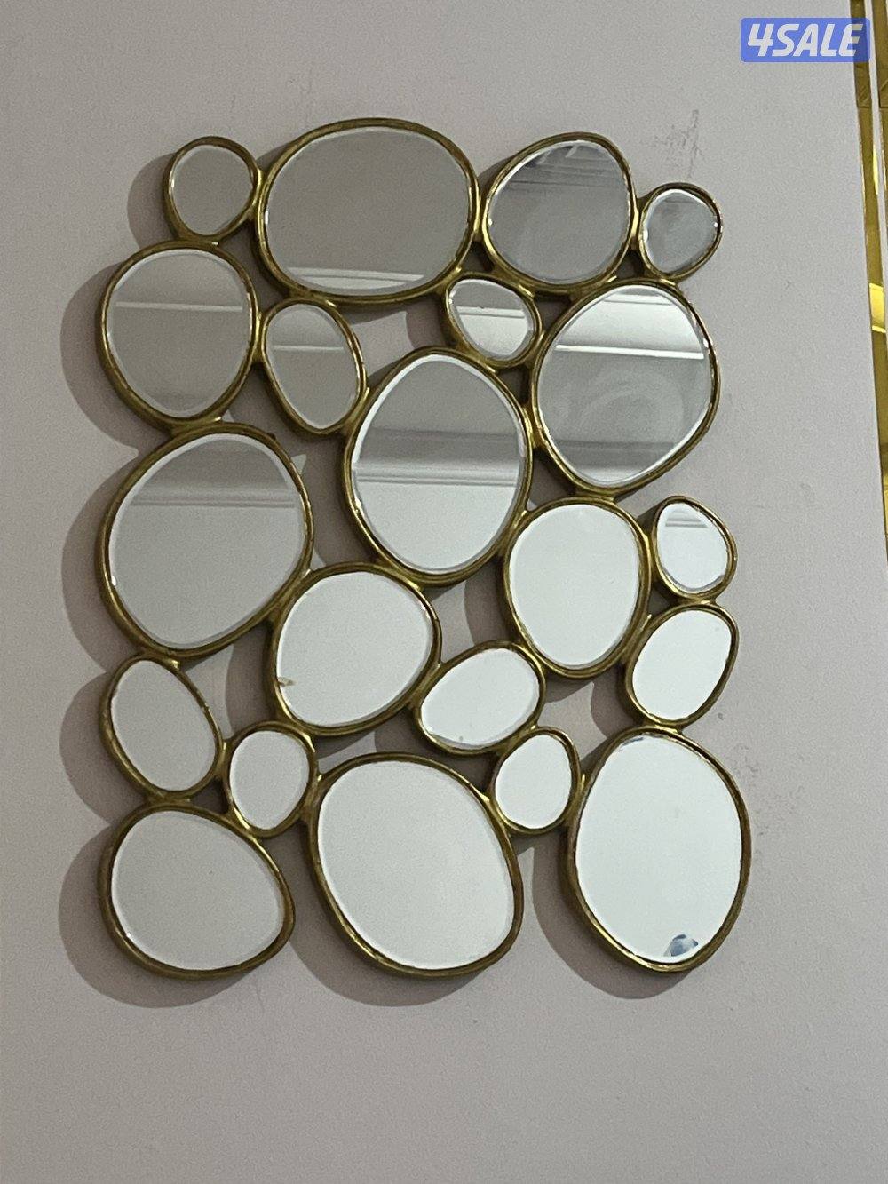 مرايه تتعلق ع الحائط0