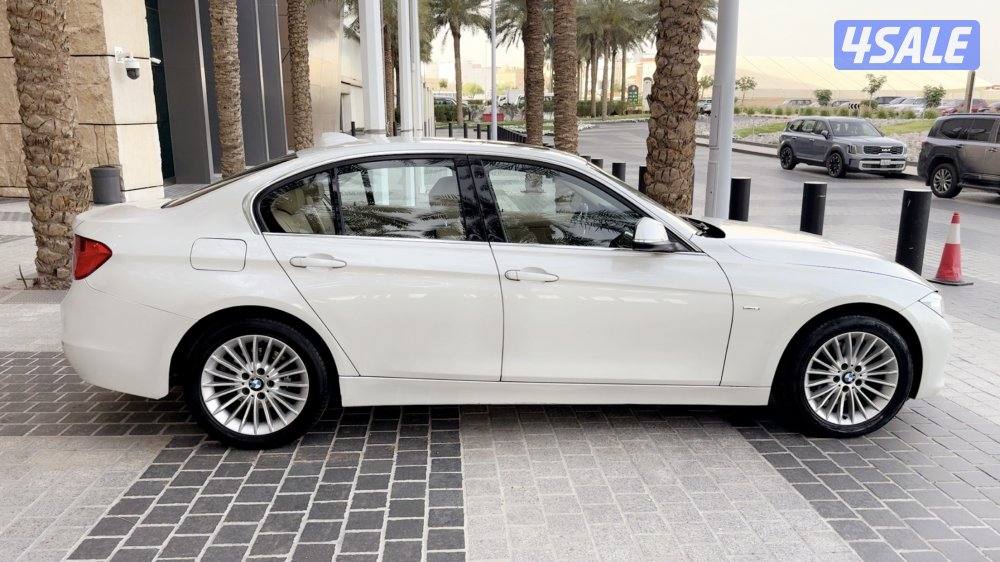 بي ام 320 i موديل 2014 وكالة صبغ الوكالة عدا قطعة3