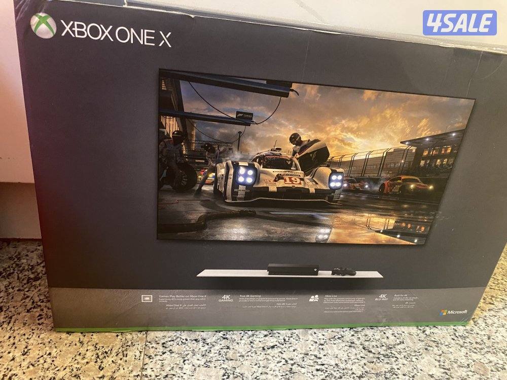 X-box1x black with black controller  1t  new used for only one week2