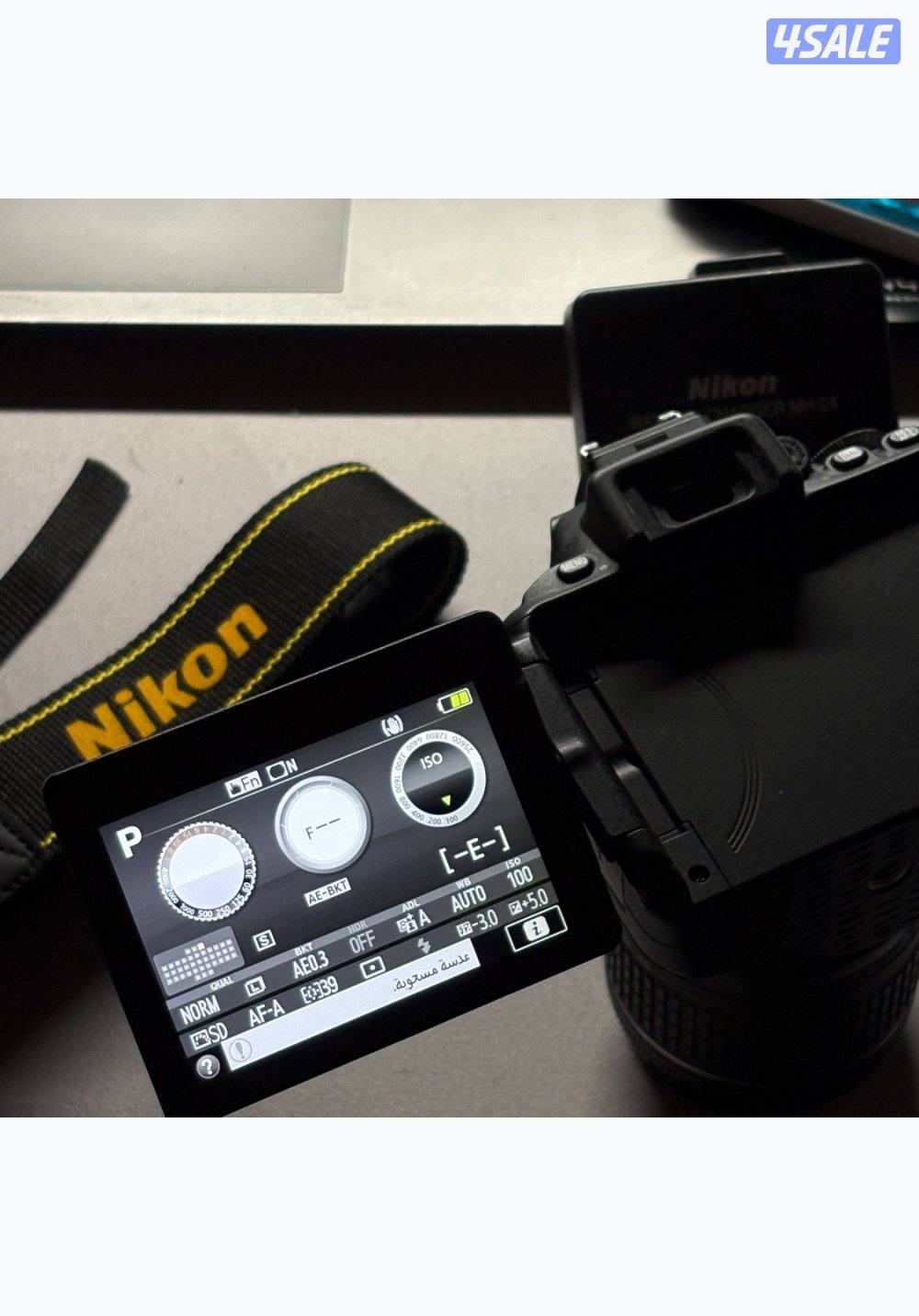 Nikon D5600 مع العدسة – حالة ممتازة - استعمال خفيف .1