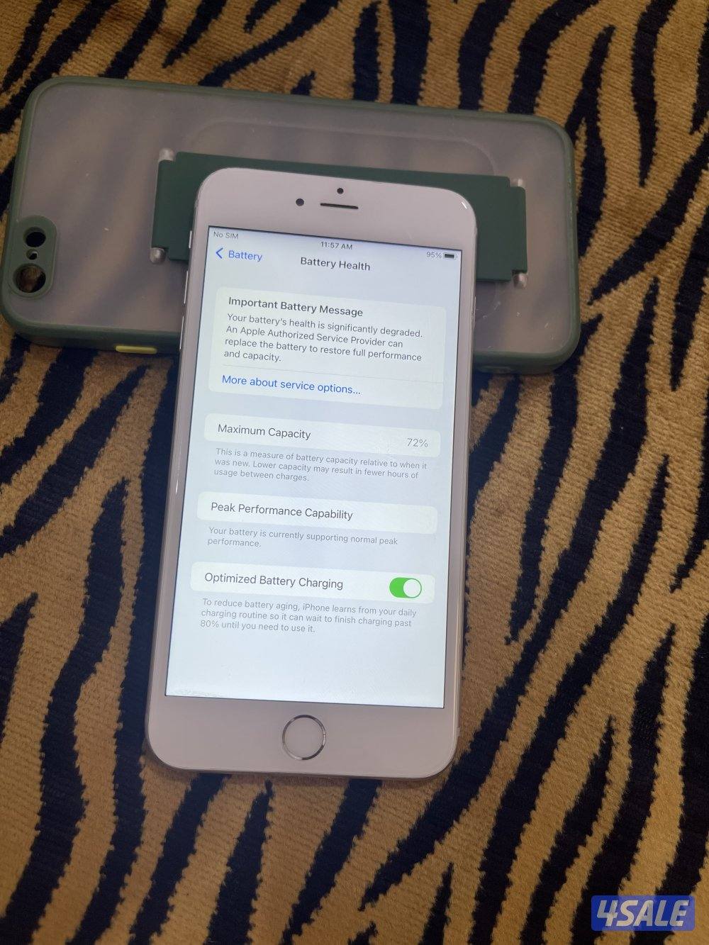 ايفون 6s بلس 64 قيقا شغال زين مع كفر وشاحن5