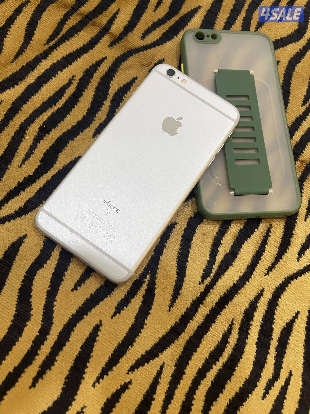 ايفون 6s بلس 64 قيقا شغال زين مع كفر وشاحن7