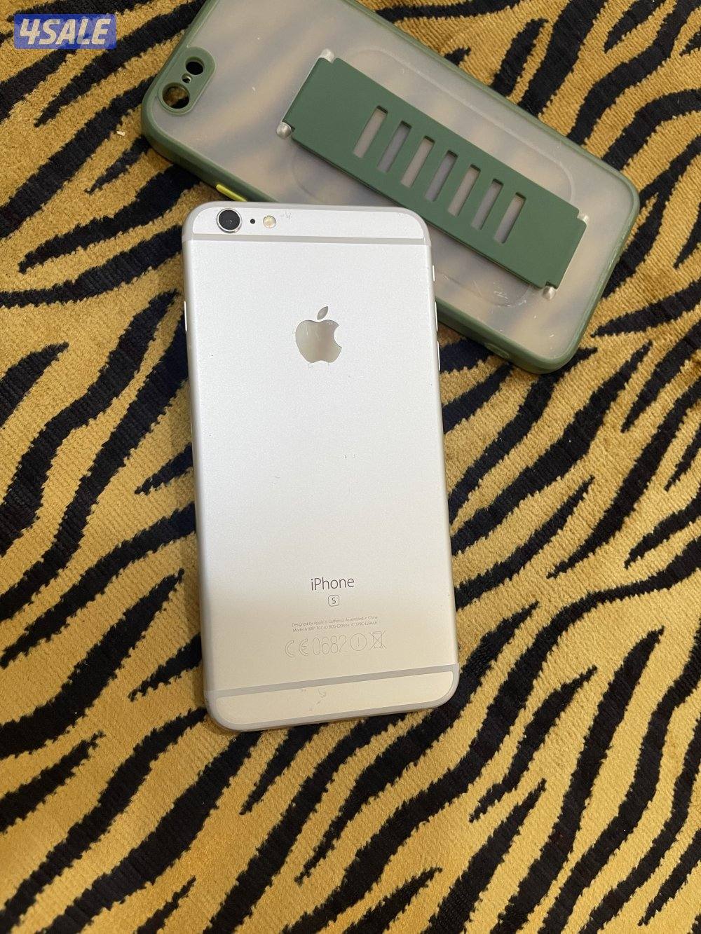 ايفون 6s بلس 64 قيقا شغال زين مع كفر وشاحن8