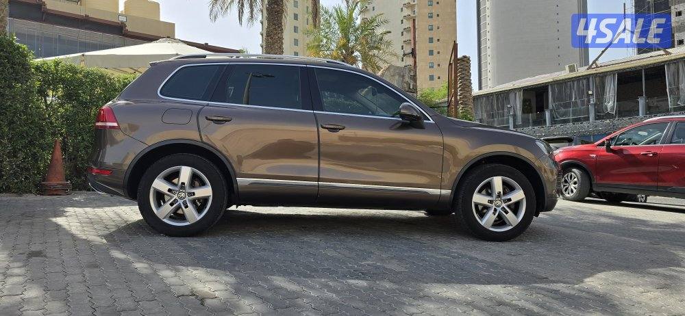 طوارق 2014 كامل المواصفات لون بني وشرط الفحص قير ماكينه شاصي0