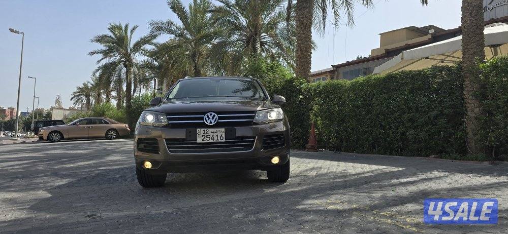 طوارق 2014 كامل المواصفات لون بني وشرط الفحص قير ماكينه شاصي1