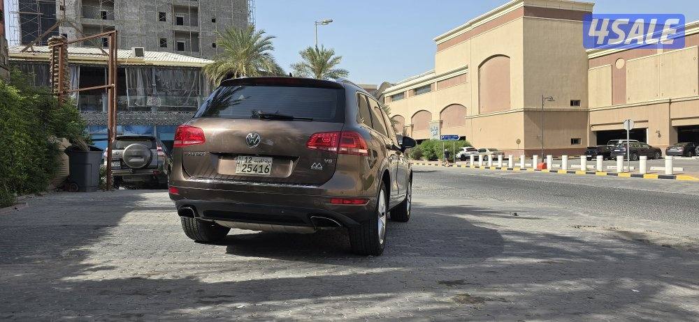 طوارق 2014 كامل المواصفات لون بني وشرط الفحص قير ماكينه شاصي2