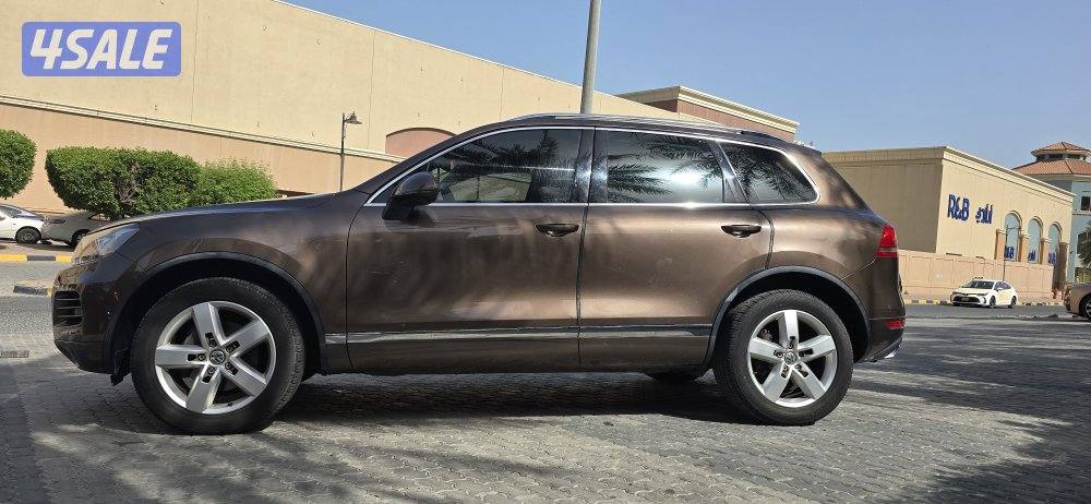 طوارق 2014 كامل المواصفات لون بني وشرط الفحص قير ماكينه شاصي3