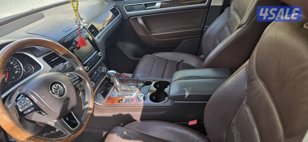 طوارق 2014 كامل المواصفات لون بني وشرط الفحص قير ماكينه شاصي4