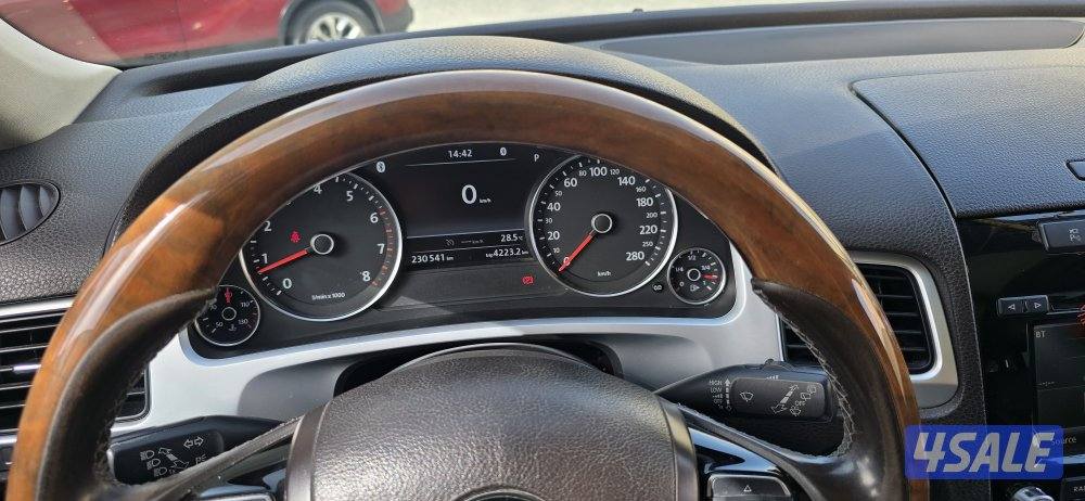 طوارق 2014 كامل المواصفات لون بني وشرط الفحص قير ماكينه شاصي6