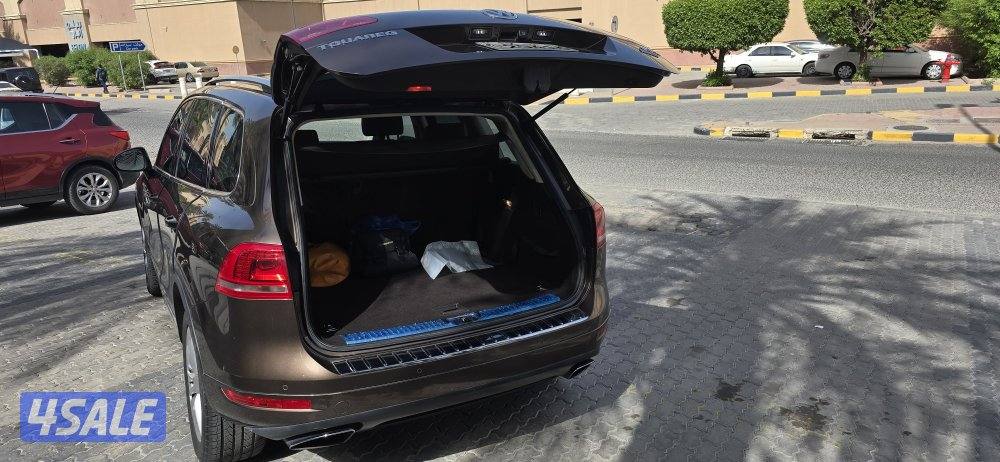 طوارق 2014 كامل المواصفات لون بني وشرط الفحص قير ماكينه شاصي9