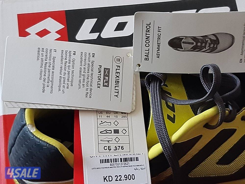 حذاء كرة  قدم من لوتو  لون اصفر ورمادي مقاس ٤٤2