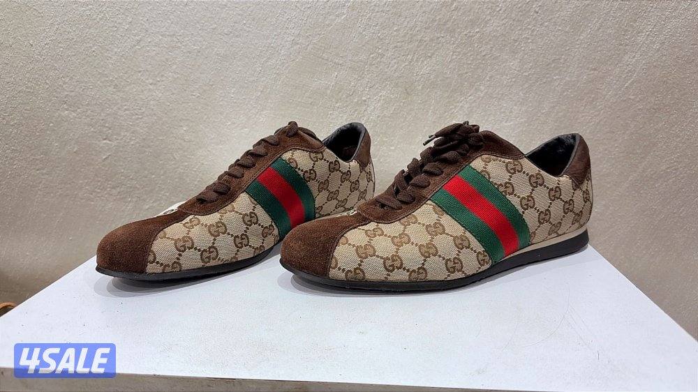 قوتشي + أرماني0