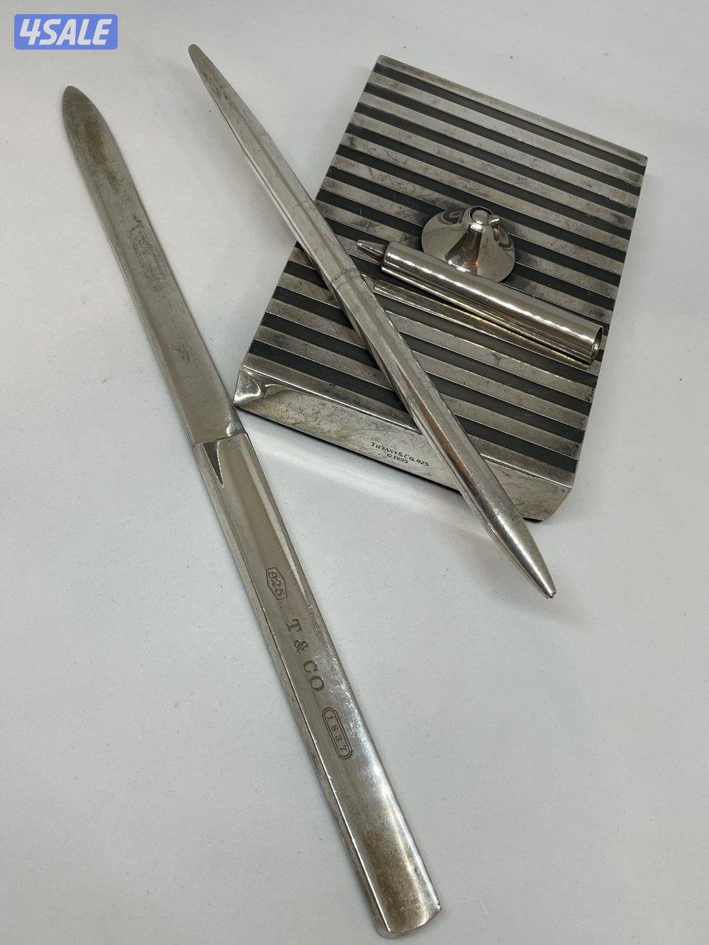 قطع مكتبية ماركة تيفاني أند كو فضة0