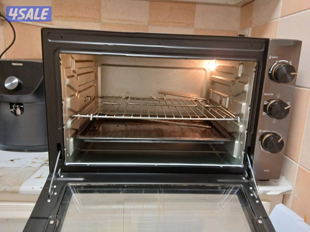 فرن صغير لتوفير الاستخدام الثقيل يوجد غلايه ماي سعره 2دينار وطباخ صغير1
