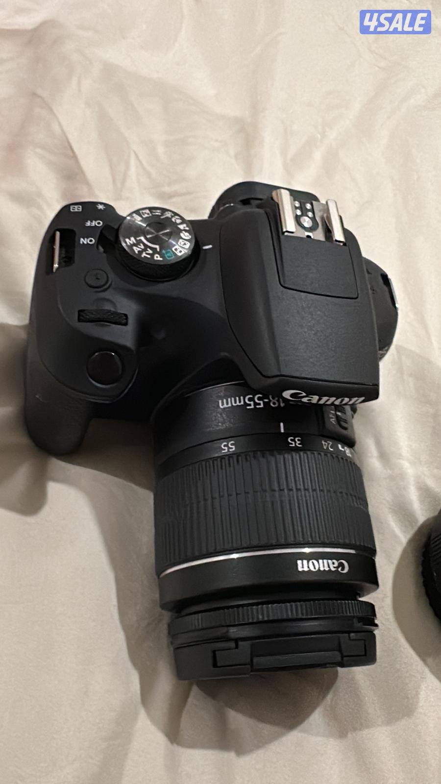 كاميرا كانون 2000d عدستين بكامل محتوياته2