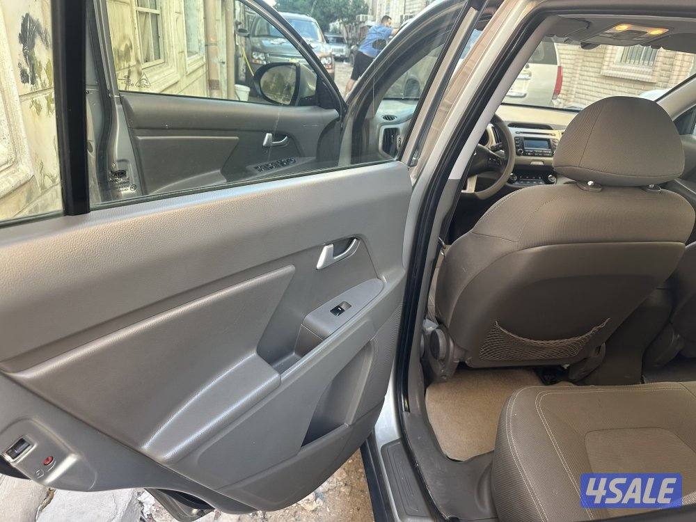 كيا سبورتاج 2015 شرط الفحص  1600سيً سي 4 سلندر6