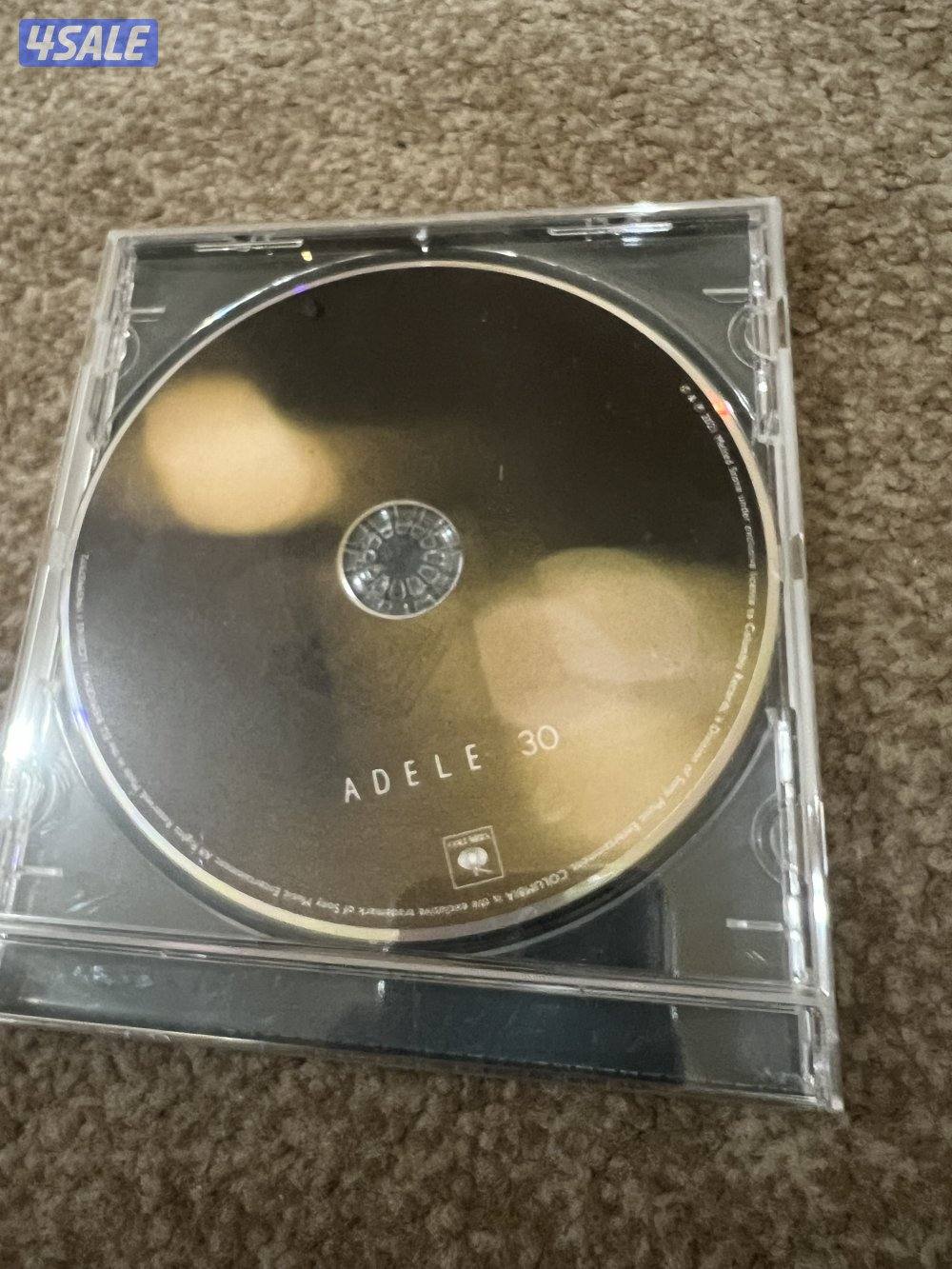 جهاز سي دي مع اشرطة سي دي1