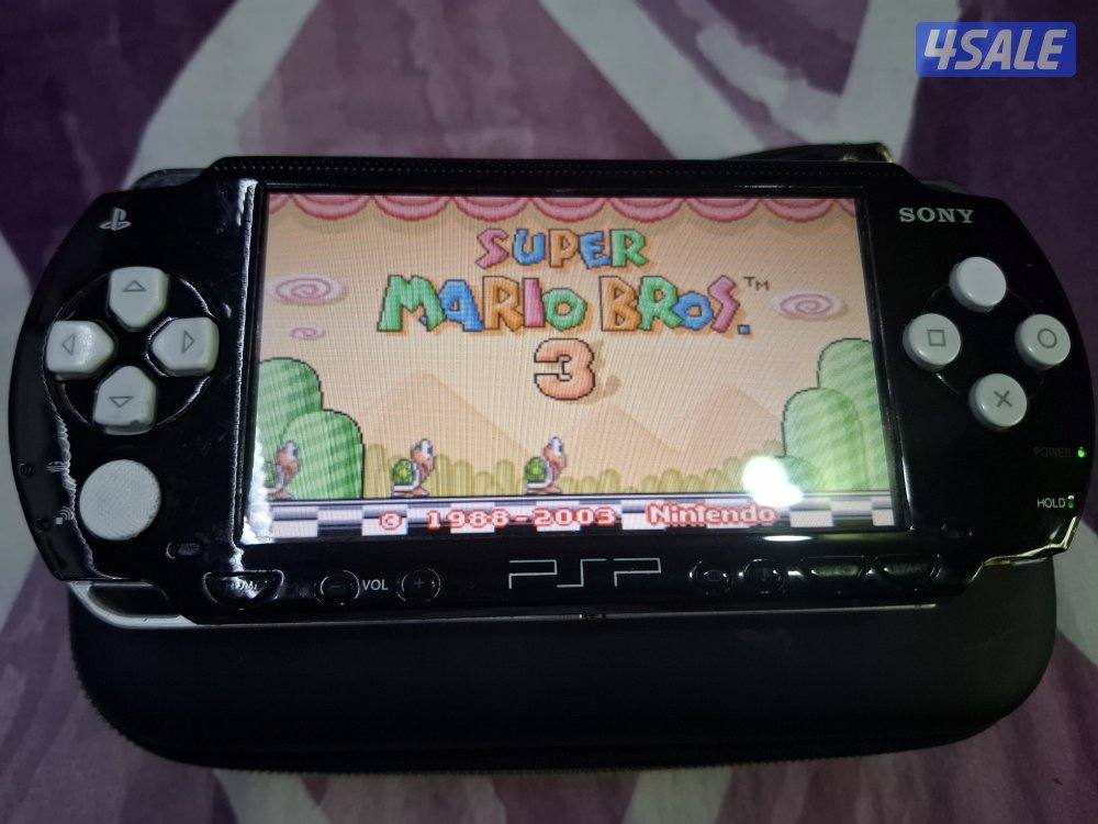 PSP SONY P1000 MODEL.BLACK & WHITE COLOR 8GB SD CARD WITH 50GAMES0