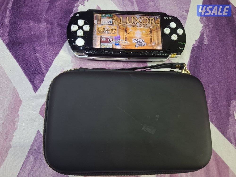 PSP SONY P1000 MODEL.BLACK & WHITE COLOR 8GB SD CARD WITH 50GAMES2